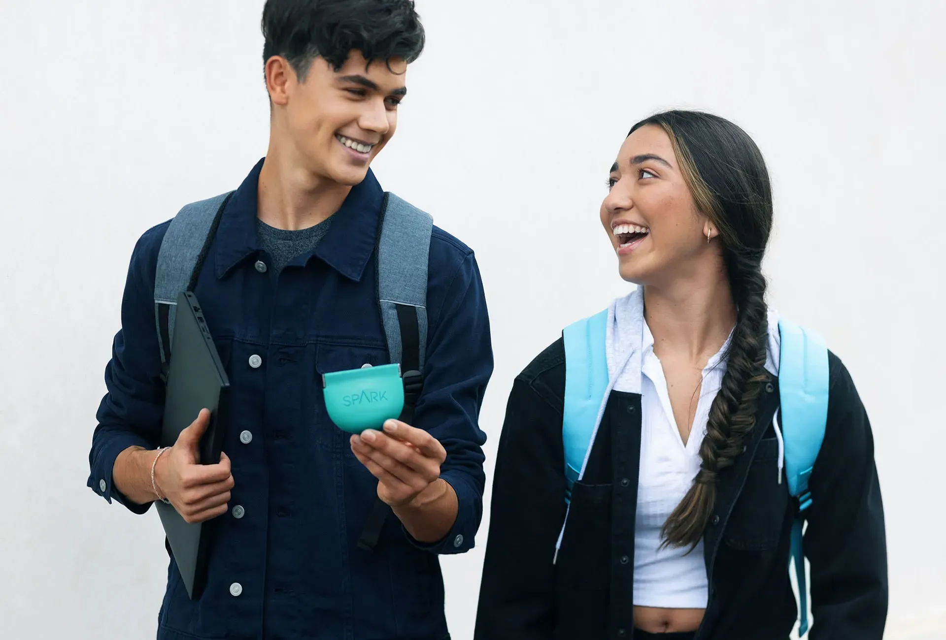 teen-couple-walking-with-spark-aligners-cut.webp